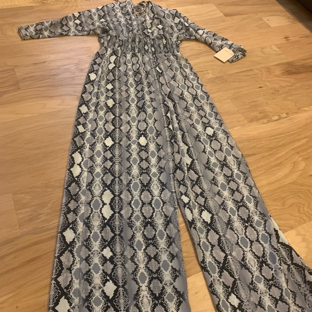 Bebop Snakeskin Black and White Pant Jumpsuit with v-neck and tie back sz M